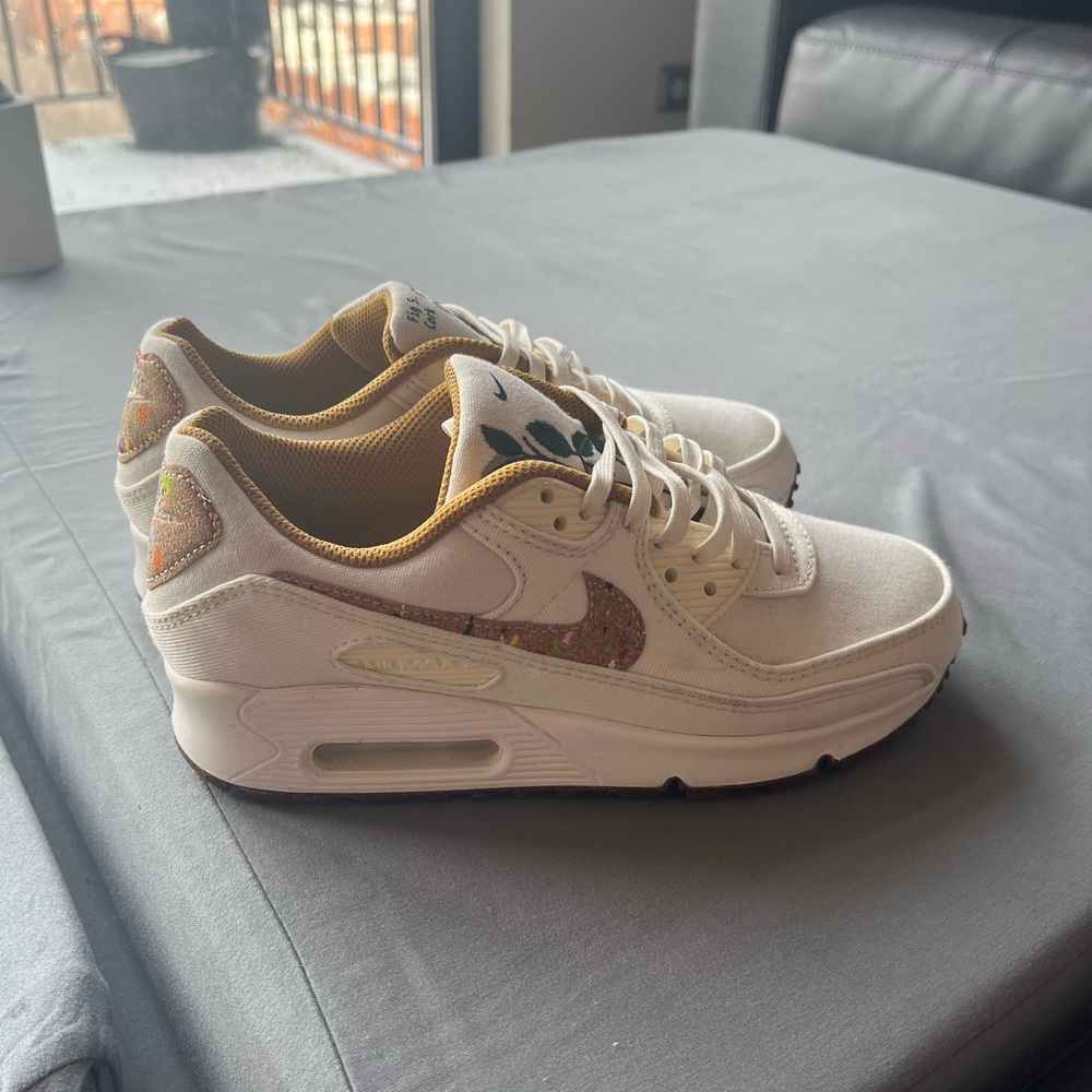 Nike Women's White and Gold Accented Sneakers